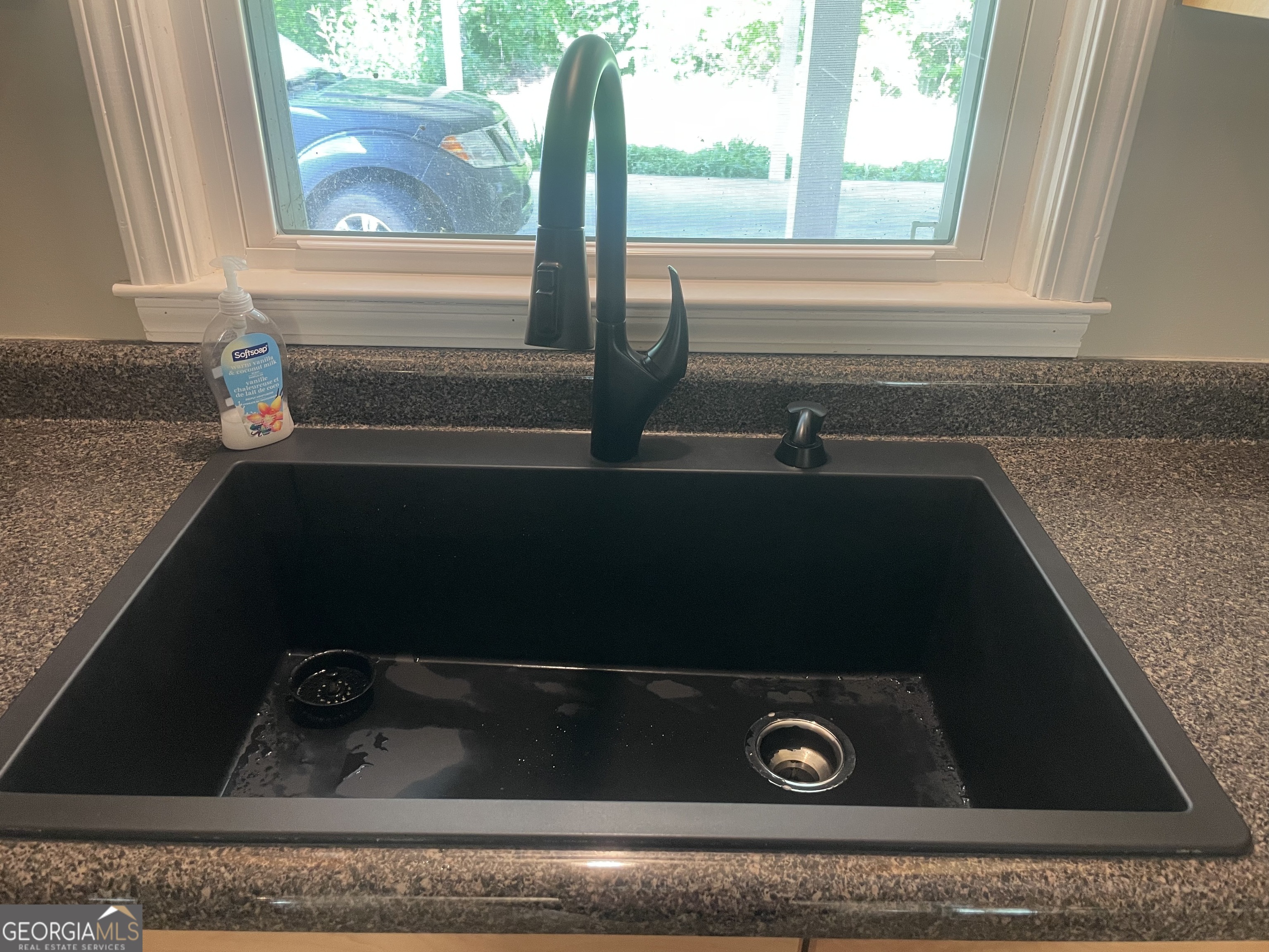 215 Old Mize Road Toccoa, GA 30577 - Photo 17 of 43 a close view of sink and microwave