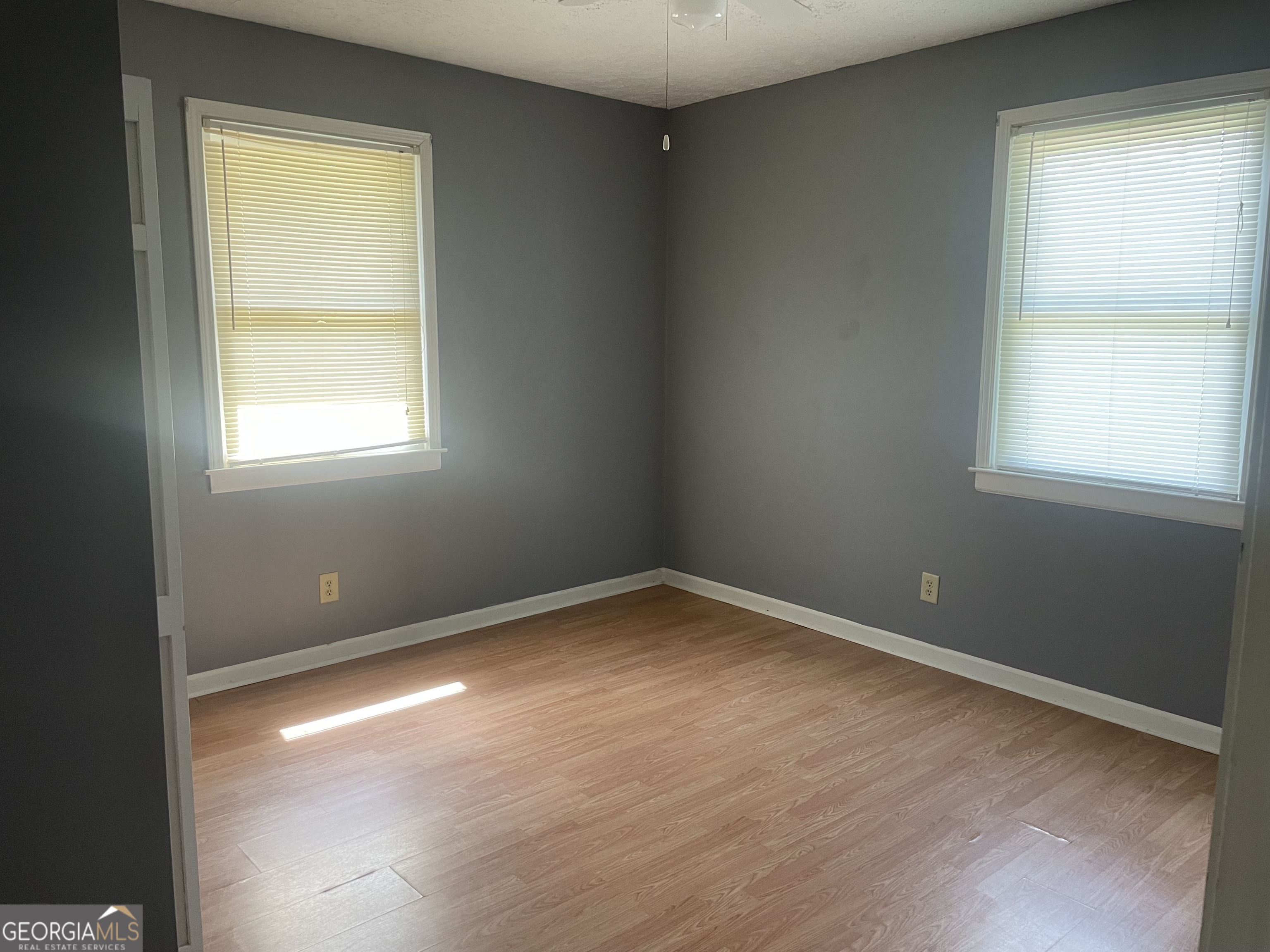 215 Old Mize Road Toccoa, GA 30577 - Photo 21 of 43 an empty room with a window