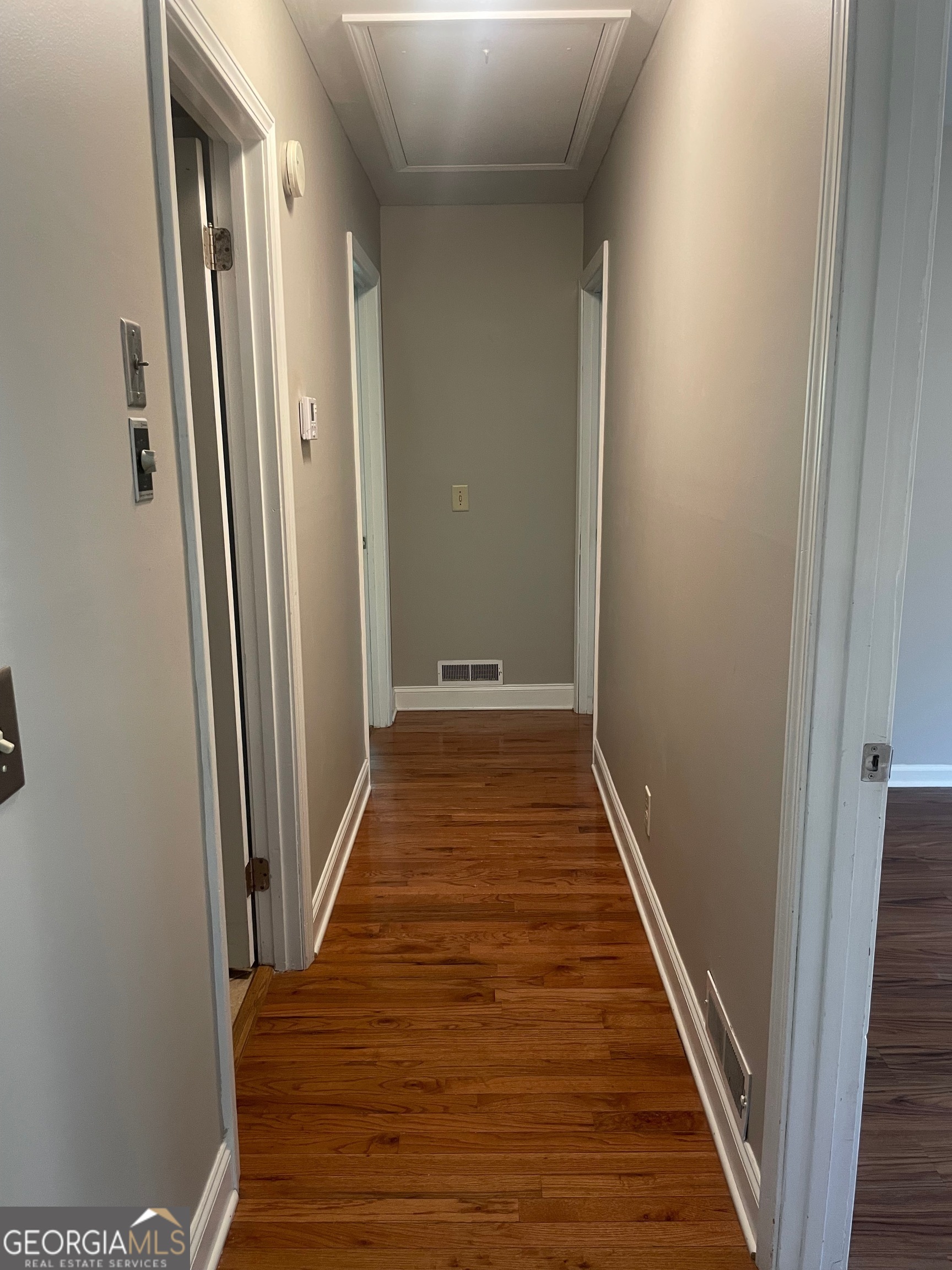 215 Old Mize Road Toccoa, GA 30577 - Photo 27 of 43 a view of a hallway with wooden floor