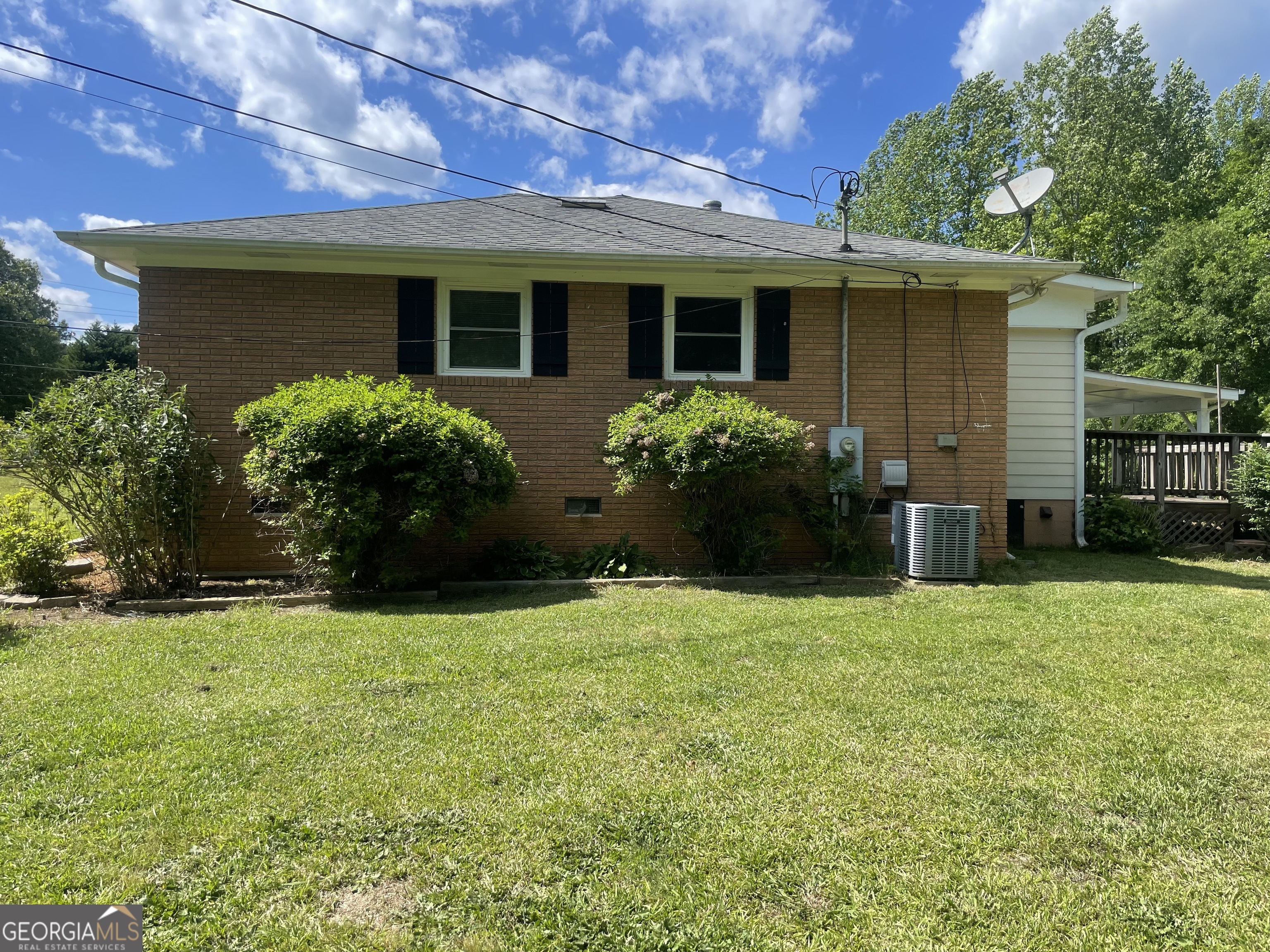 215 Old Mize Road Toccoa, GA 30577 - Photo 38 of 43 a view of a house with backyard and garden