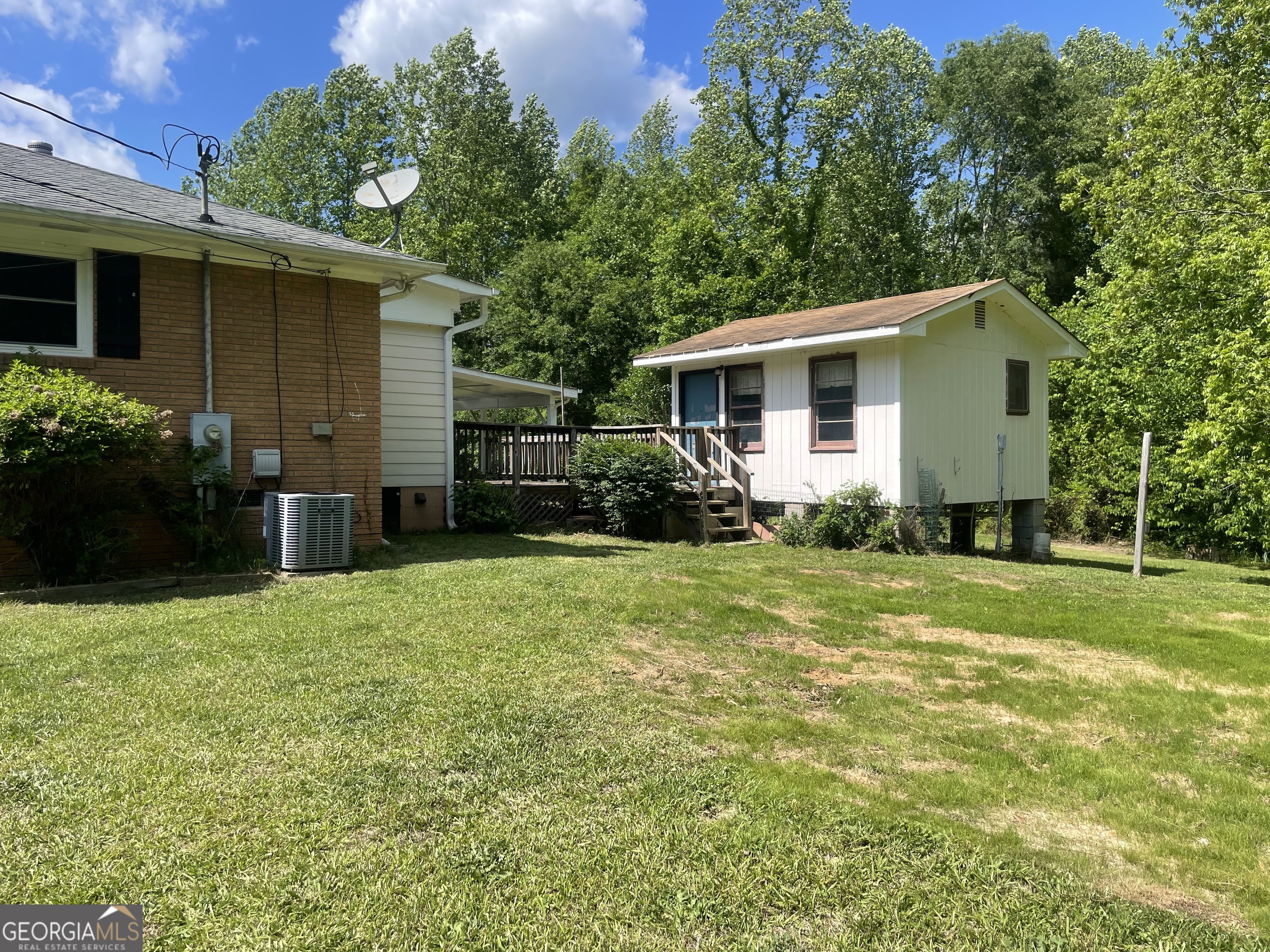 215 Old Mize Road Toccoa, GA 30577 - Photo 39 of 43 a front view of house with yard and green space