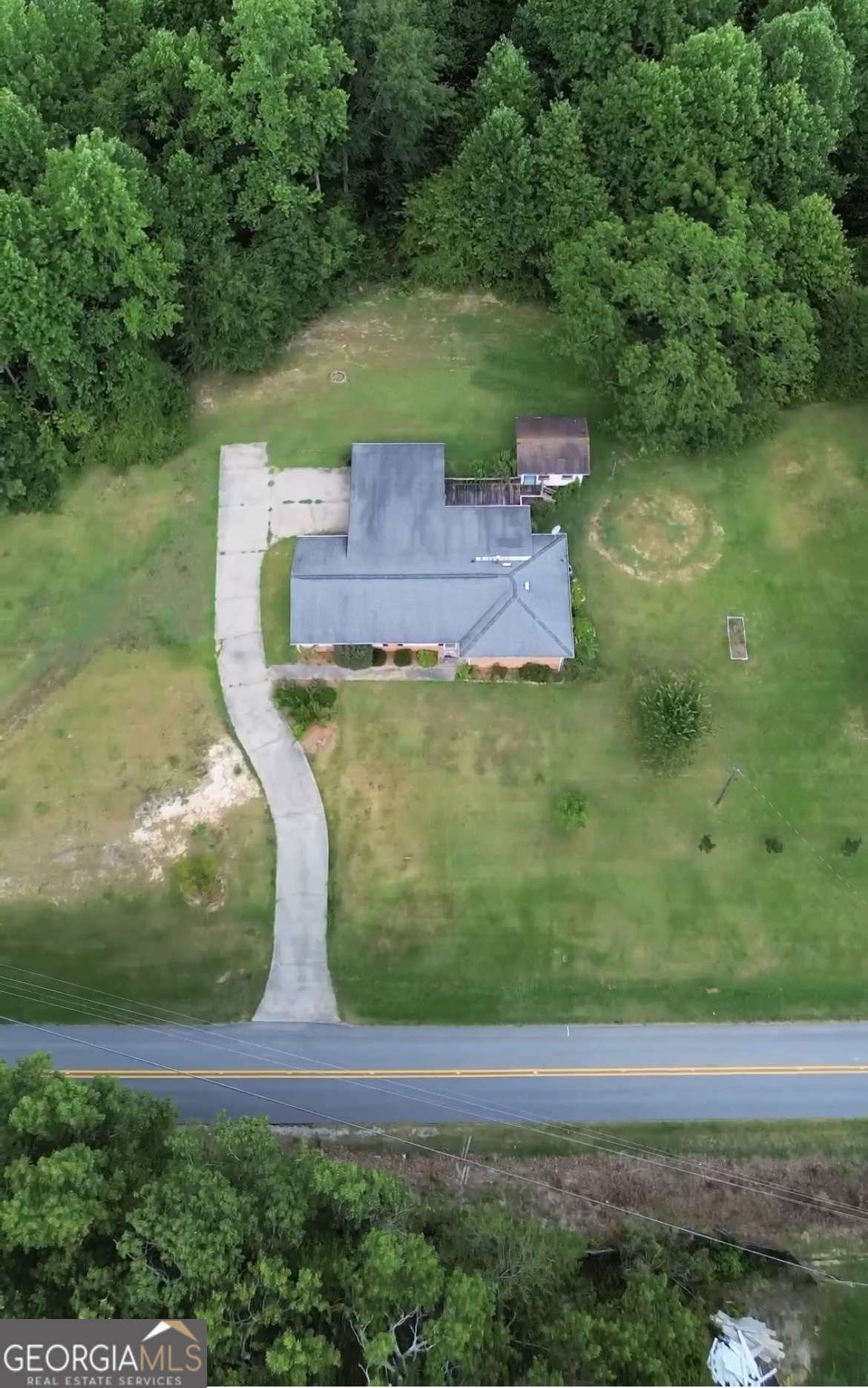 215 Old Mize Road Toccoa, GA 30577 - Photo 5 of 43 an aerial view of a house with a yard