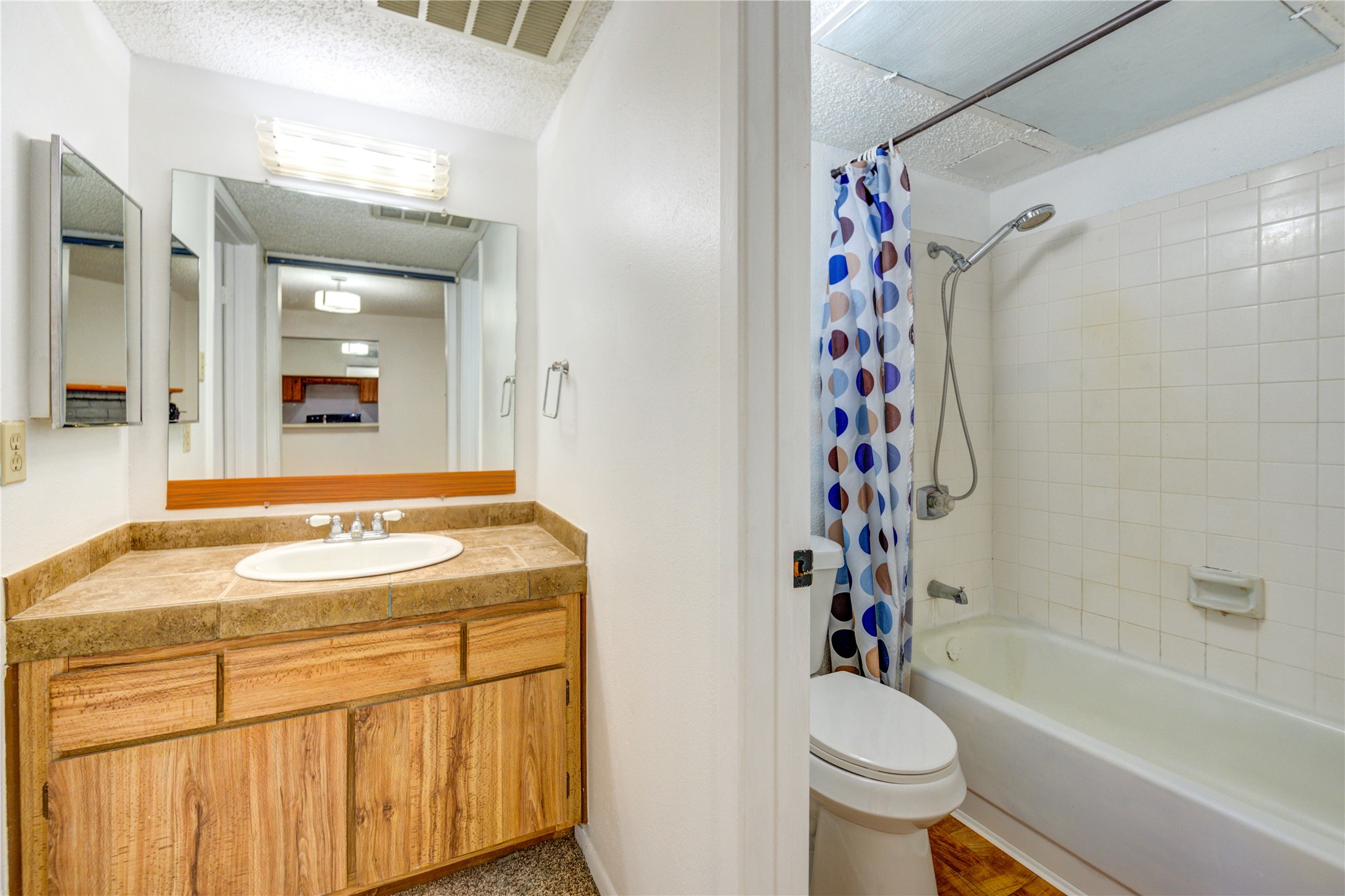 2800 Jeanetta Street, Unit 2504 Houston, TX 77063 - Photo 11 of 49 a bathroom with a sink toilet and shower