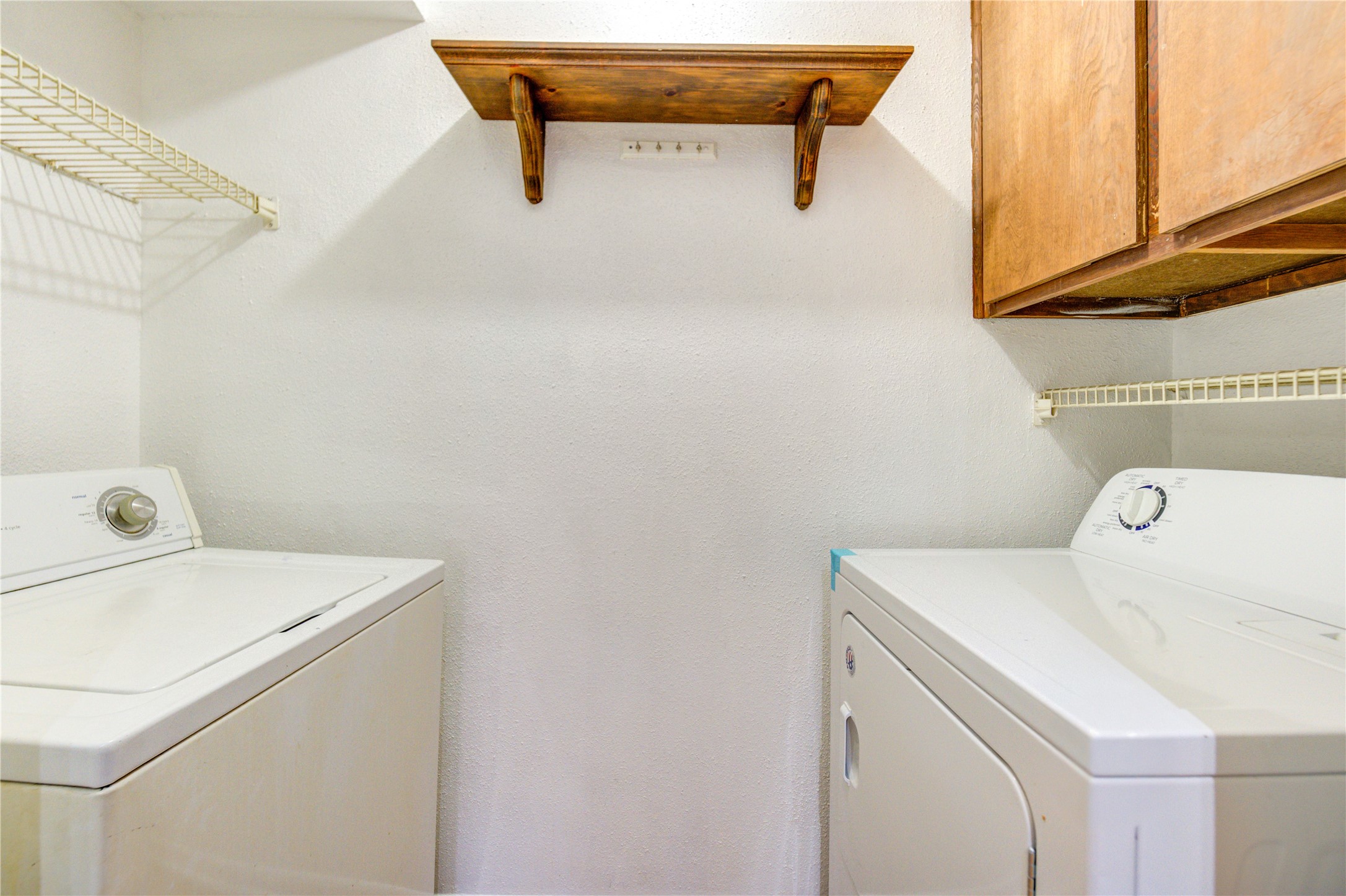 2800 Jeanetta Street, Unit 2504 Houston, TX 77063 - Photo 31 of 49 a utility room with dryer and washer