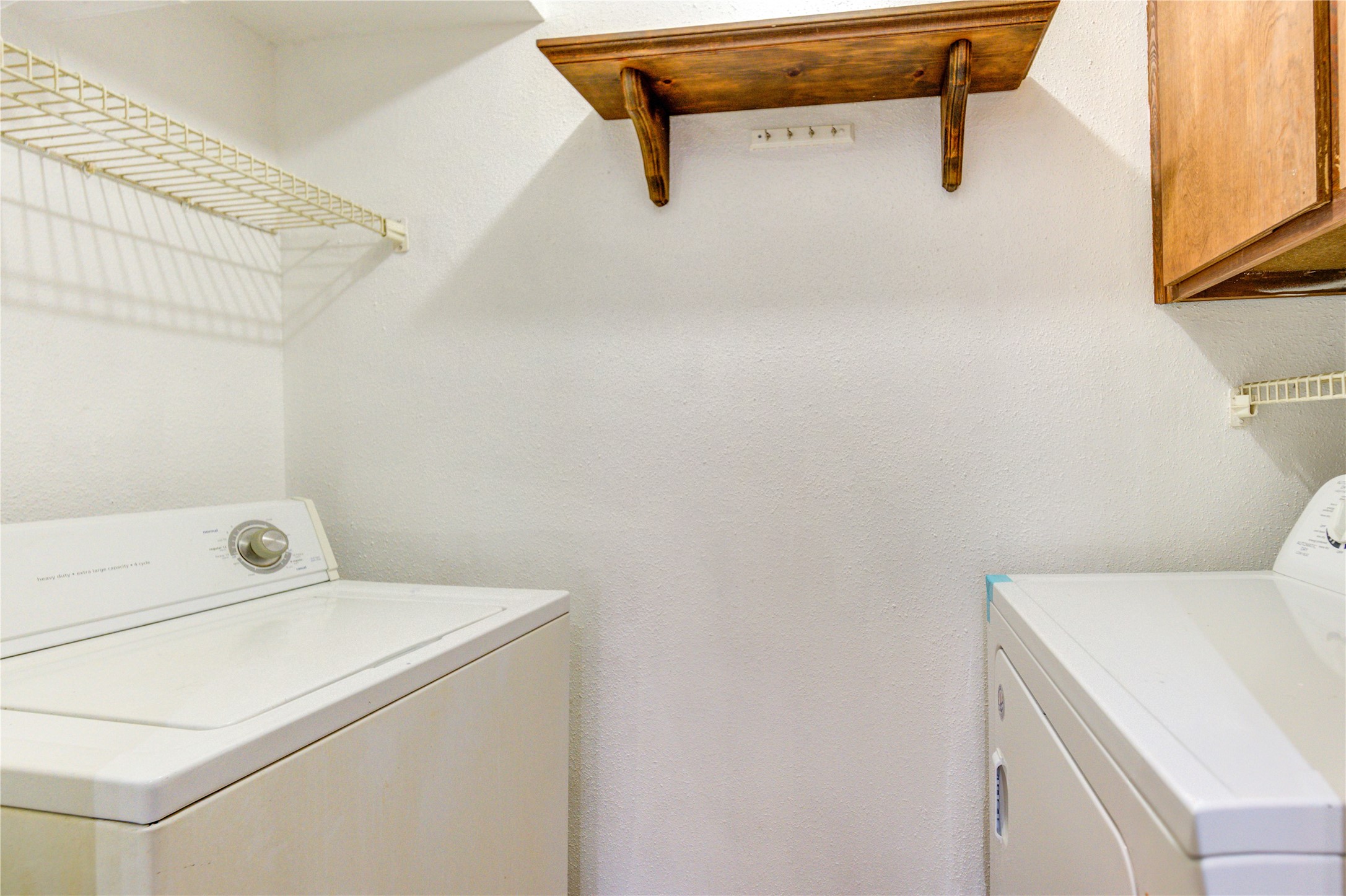 2800 Jeanetta Street, Unit 2504 Houston, TX 77063 - Photo 32 of 49 a utility room with dryer and washer