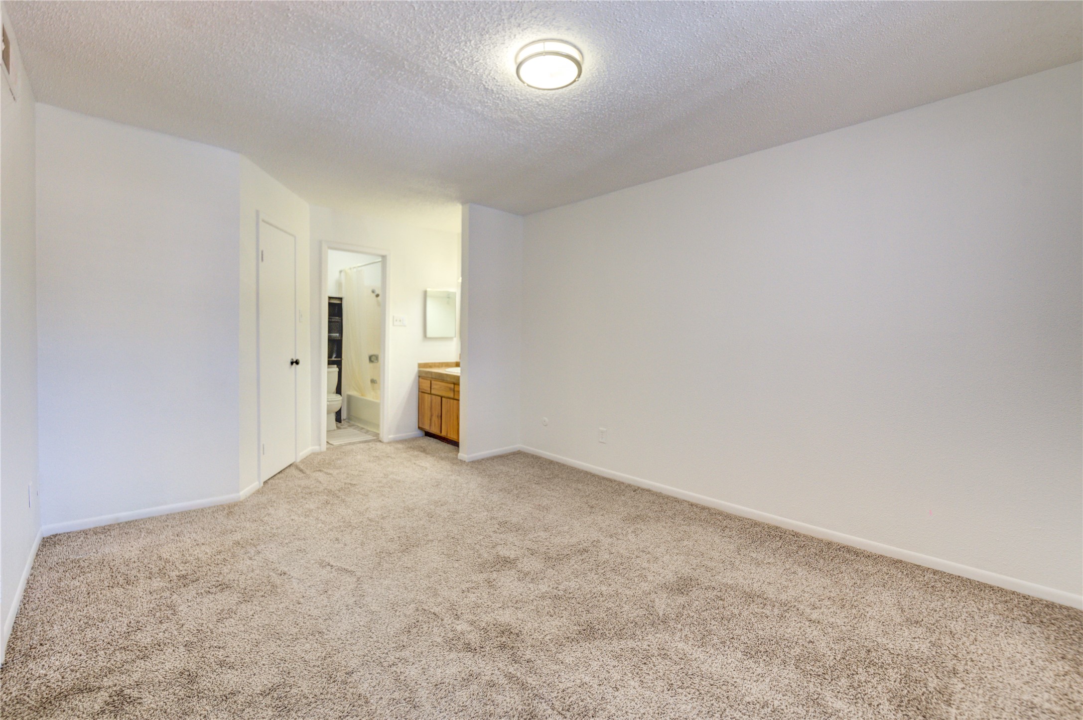 2800 Jeanetta Street, Unit 2504 Houston, TX 77063 - Photo 34 of 49 an empty room with a window