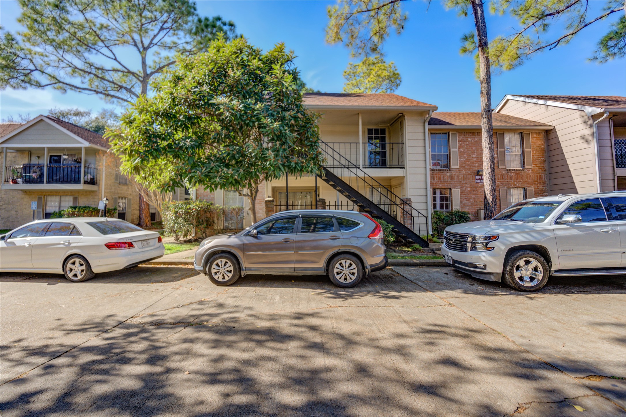 2800 Jeanetta Street, Unit 2504 Houston, TX 77063 - Photo 48 of 49 a car parked in front of a house