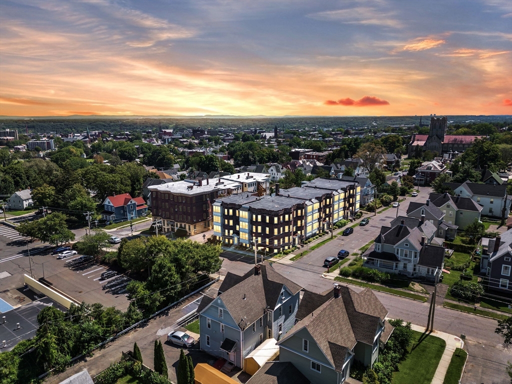 a view of a city with tall buildings