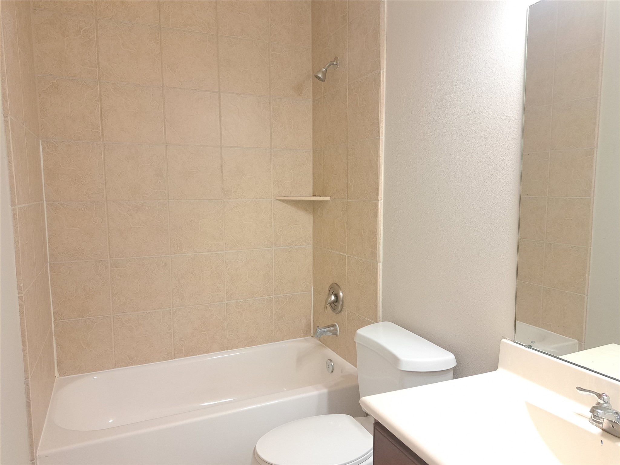 26315 Fox Ridge Lane Katy, TX 77494 - Photo 35 of 39 a bathroom with a bathtub and sink