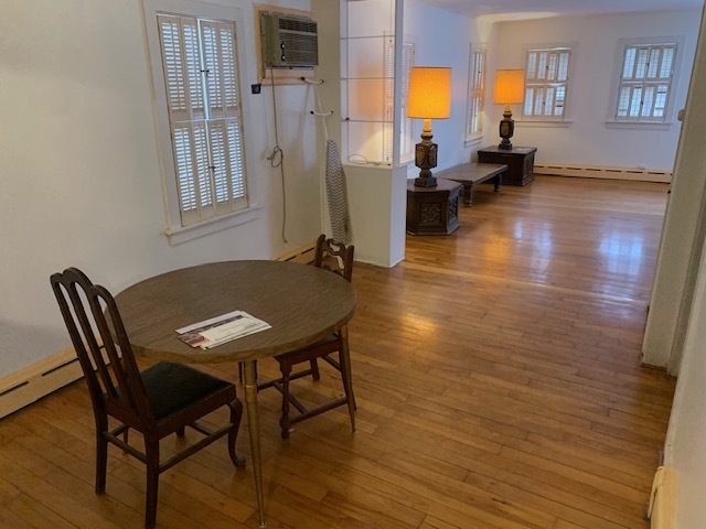 3008 Lincoln Road Oak Brook, IL 60523 - Photo 4 of 15 a view of a dining room with furniture and a chandelier