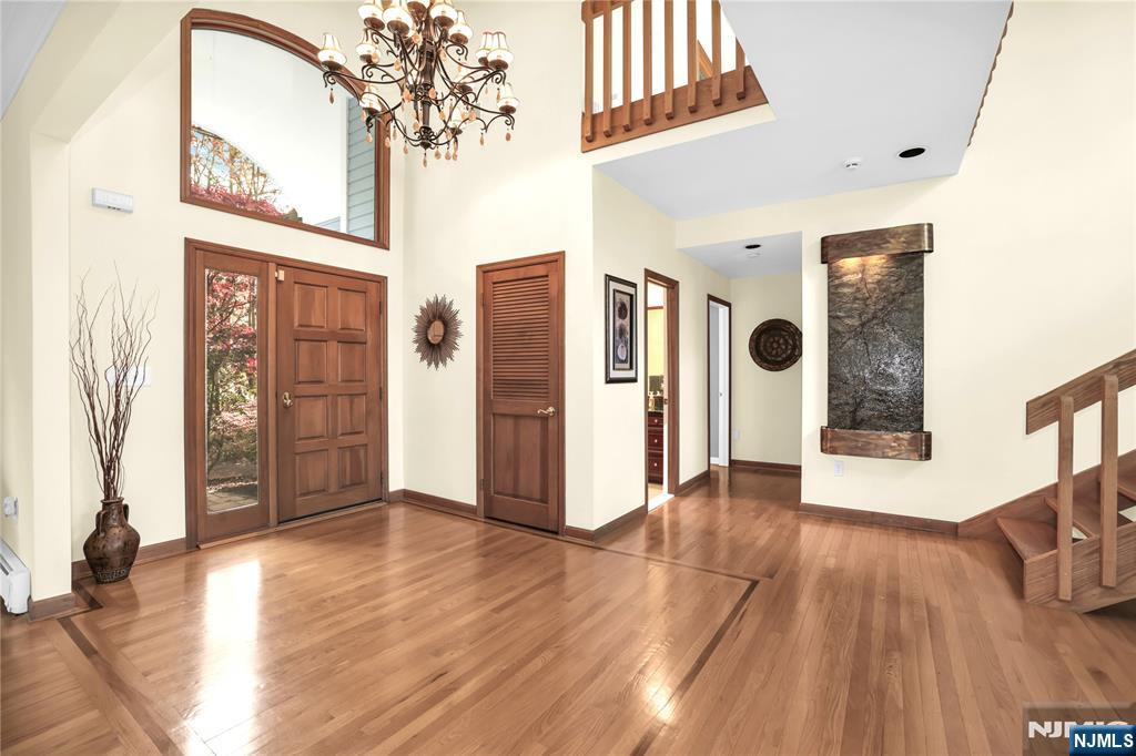 738 Ridge Road Butler, NJ 07405 - Photo 12 of 50 a view of an entryway with wooden floor