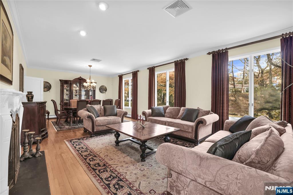 738 Ridge Road Butler, NJ 07405 - Photo 14 of 50 a living room with furniture and a large window