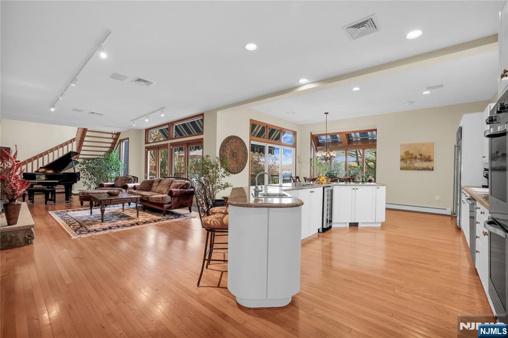 738 Ridge Road Butler, NJ 07405 - Photo 20 of 50 a living room with furniture and a large window