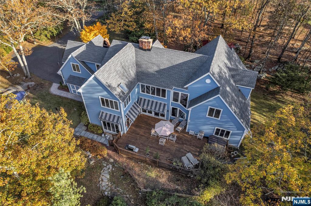 738 Ridge Road Butler, NJ 07405 - Photo 2 of 50 a view of a house with a yard