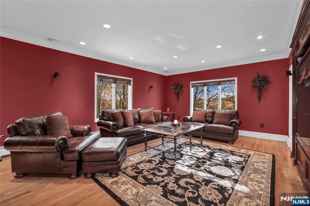 738 Ridge Road Butler, NJ 07405 - Photo 29 of 50 a living room with furniture and a window