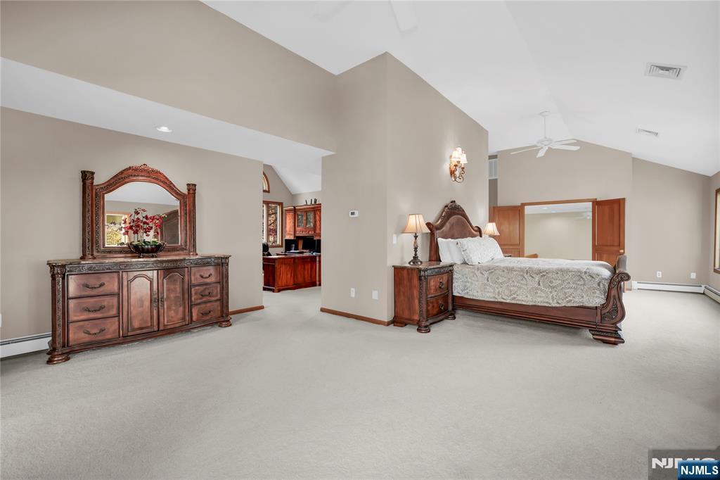 738 Ridge Road Butler, NJ 07405 - Photo 39 of 50 a bedroom with furniture and window