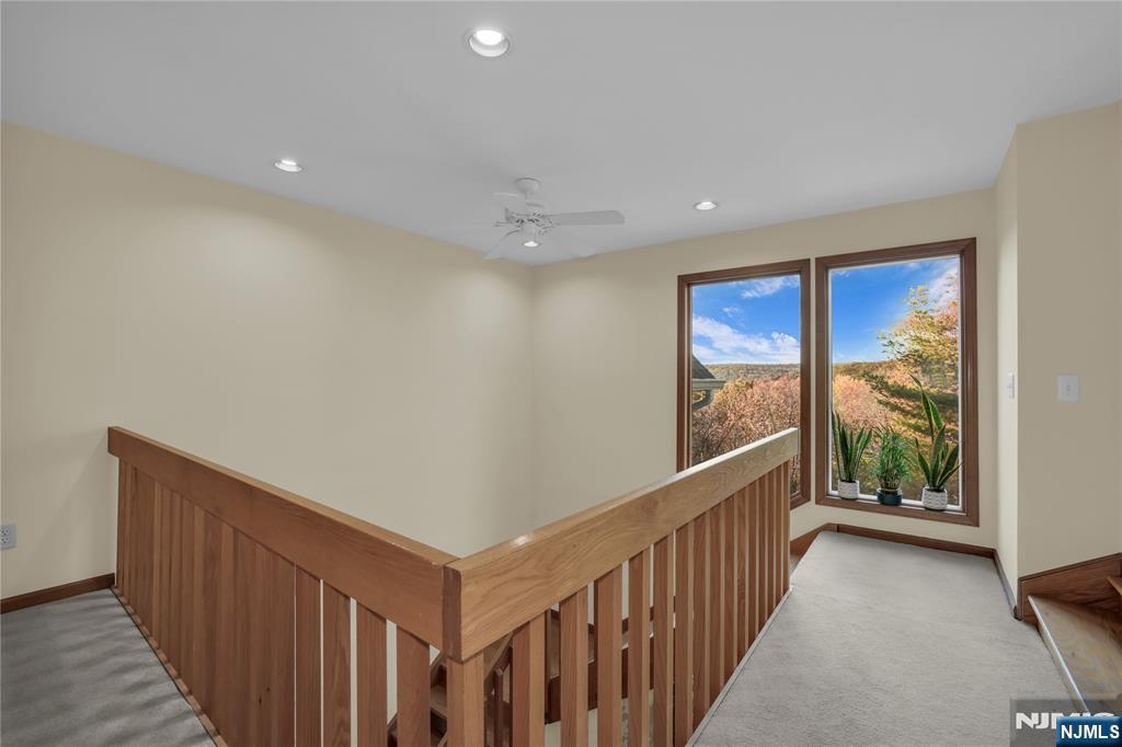 738 Ridge Road Butler, NJ 07405 - Photo 44 of 50 a view of hallway with stairs