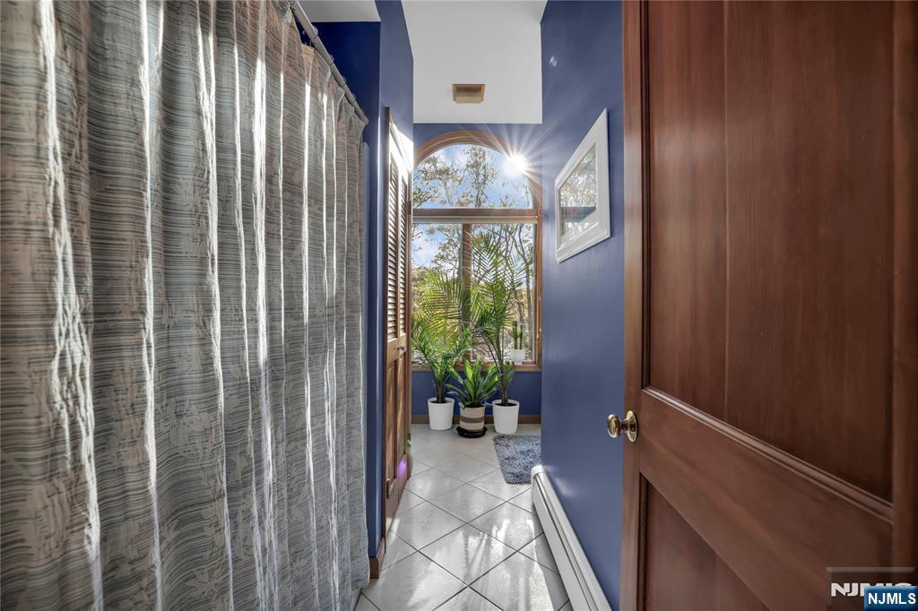 738 Ridge Road Butler, NJ 07405 - Photo 46 of 50 a view of balcony with a potted plant