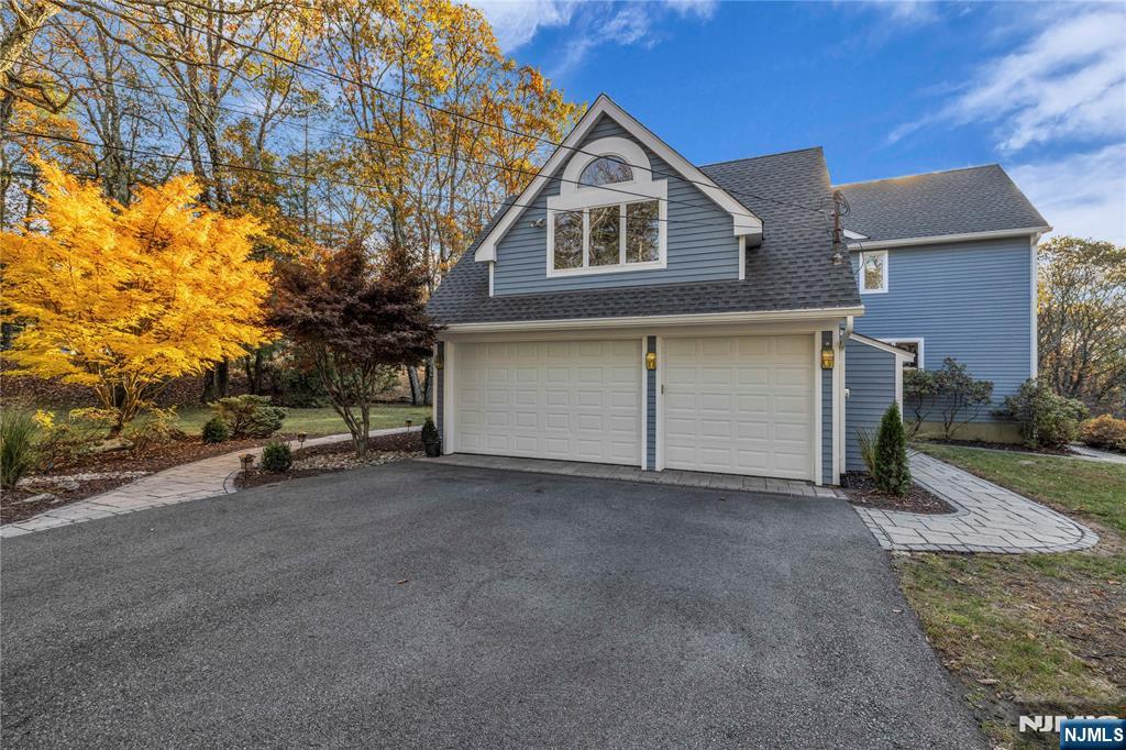 738 Ridge Road Butler, NJ 07405 - Photo 50 of 50 a view of a house with a yard