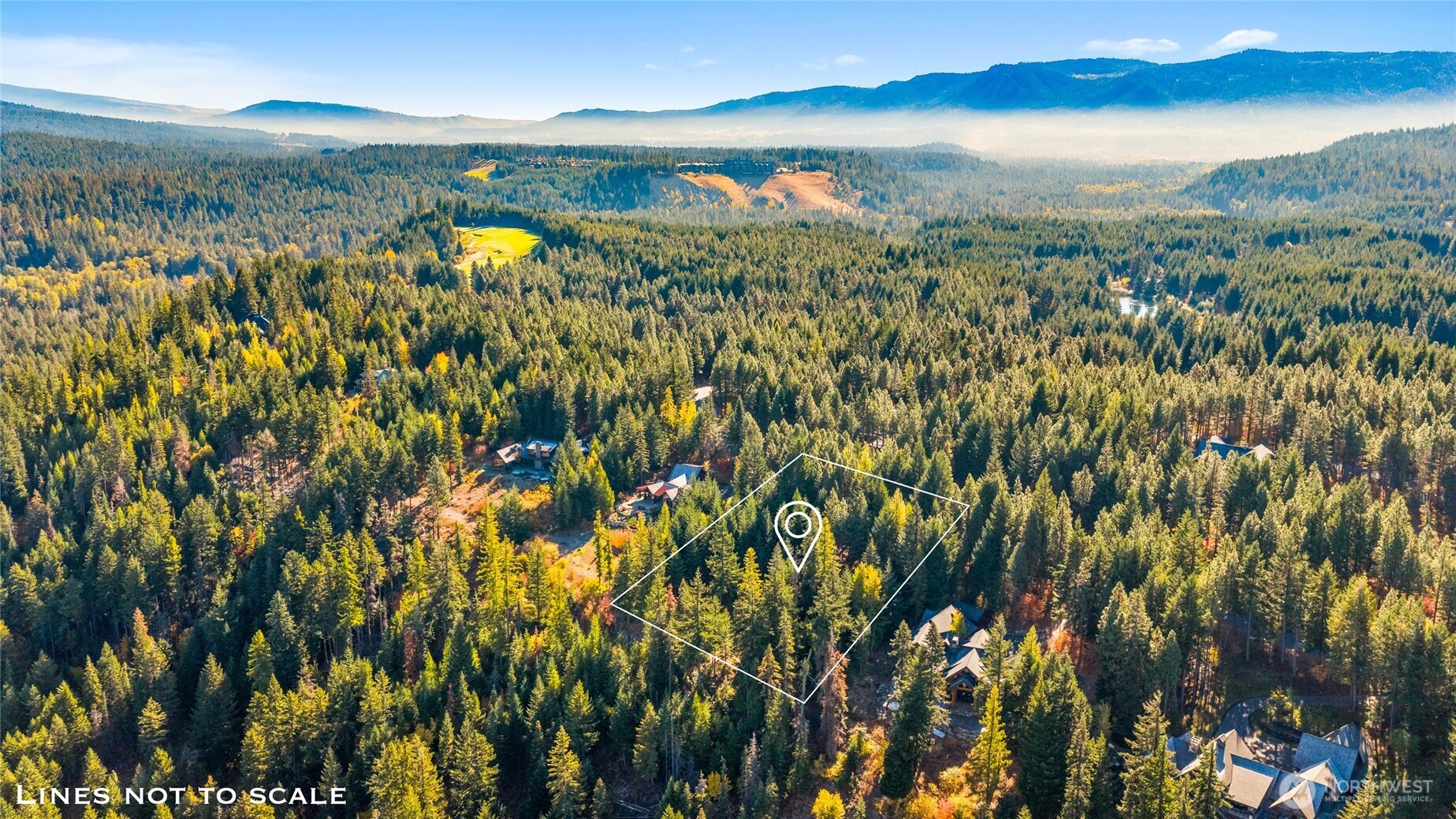 430 Iron Monarch Loop Cle Elum, WA 98922 - Photo 20 of 35 a view of a lake with a mountain in the background