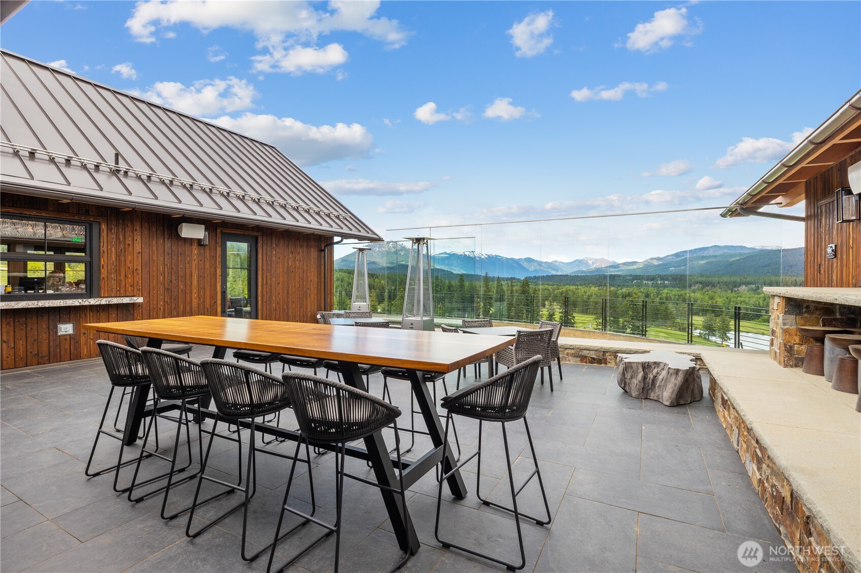 430 Iron Monarch Loop Cle Elum, WA 98922 - Photo 26 of 35 a view of a patio with a table and chairs