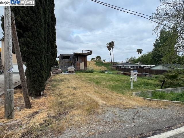 1480 Taylor Road Bethel Island, CA 94511 - Photo 20 of 20 a view of a garden with a lake