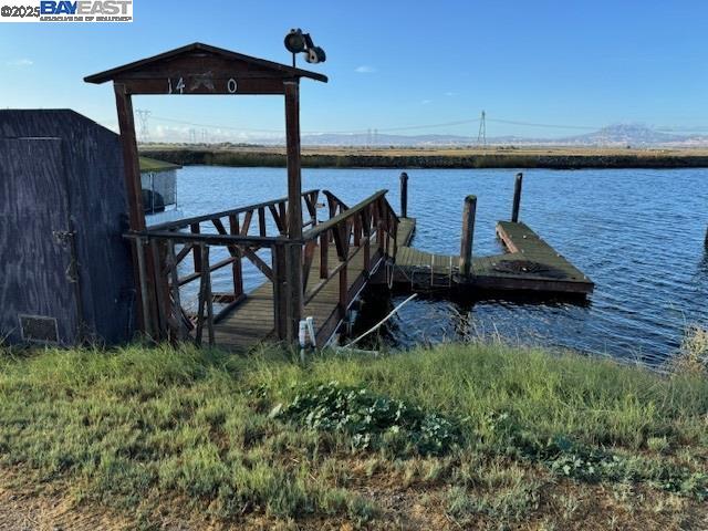 1480 Taylor Road Bethel Island, CA 94511 - Photo 3 of 20 a view of a terrace with lawn chairs next to stairs