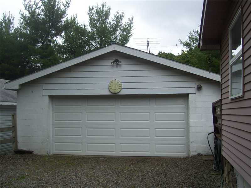 155 Cummings Road Acme, PA 15610 - Photo 4 of 4 Parking Lot/Garage. ONE LARGE DOOR WITH AUTO GARAGE DOOR OPERNER GRAVEL DRIVE WAY WILL HOLD 4 EXTRA CARS FOR GUESTS TO PARK