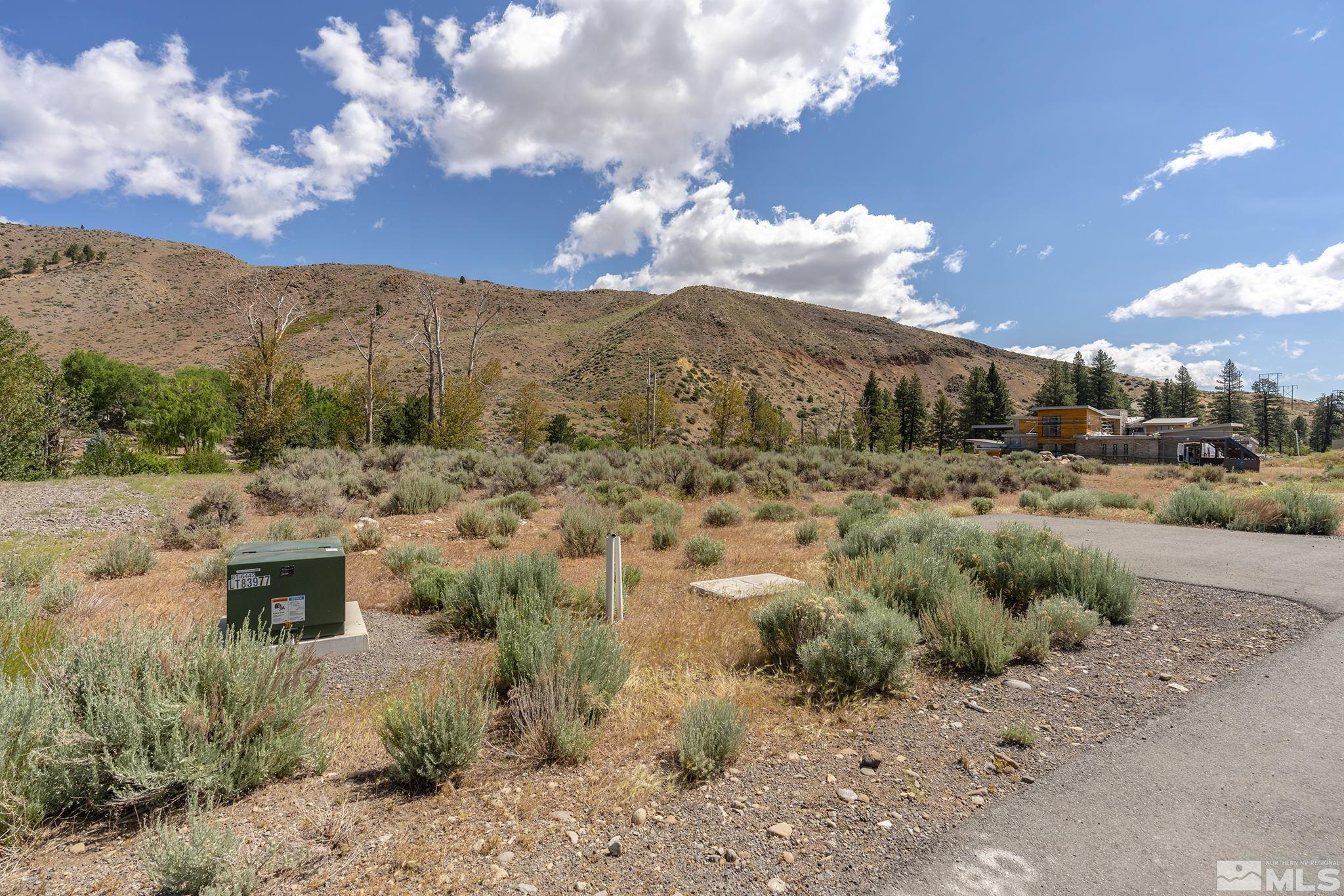 415 River Pines Drive, Unit 7 Reno, NV 89439 - Photo 14 of 27 a view of a dry yard with mountains in the background
