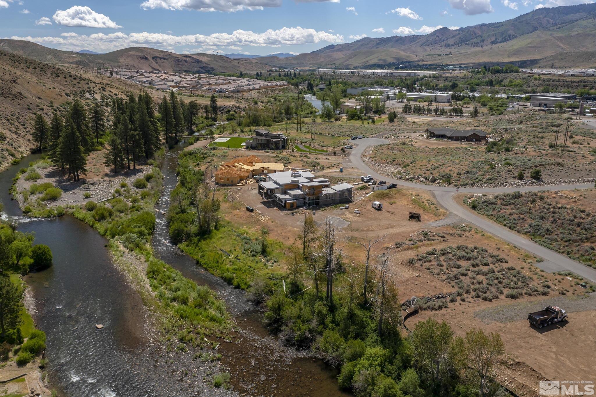 415 River Pines Drive, Unit 7 Reno, NV 89439 - Photo 5 of 27 a view of a houses with a yard