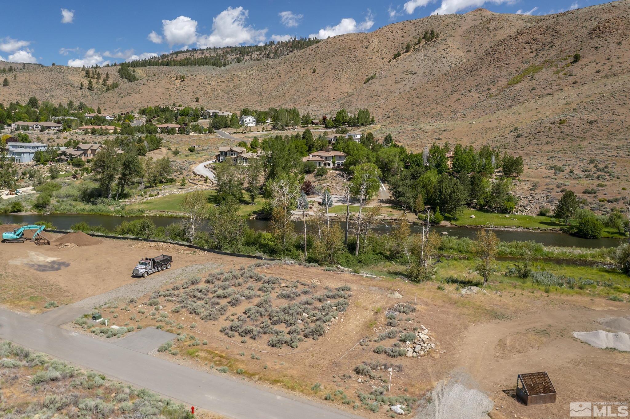 415 River Pines Drive, Unit 7 Reno, NV 89439 - Photo 10 of 27 a view of a road with a yard