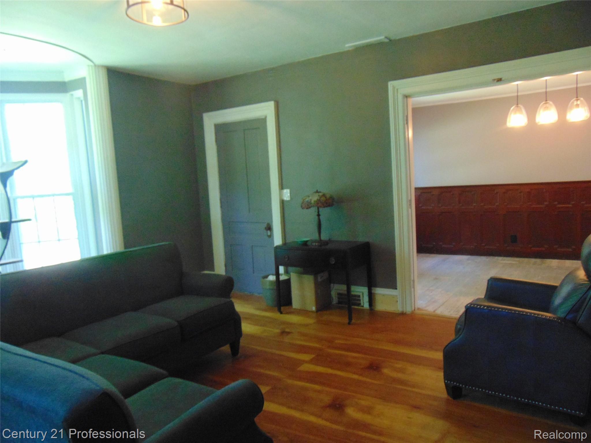 7222 Tucker Road Holly, MI 48442 - Photo 13 of 36 Living Room is Open to the Dining Room for easy entertaining.....