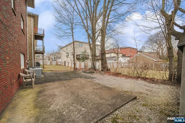 a view of a yard with brick house