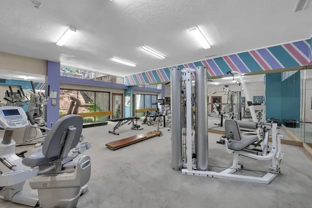 a view of a room with gym equipment