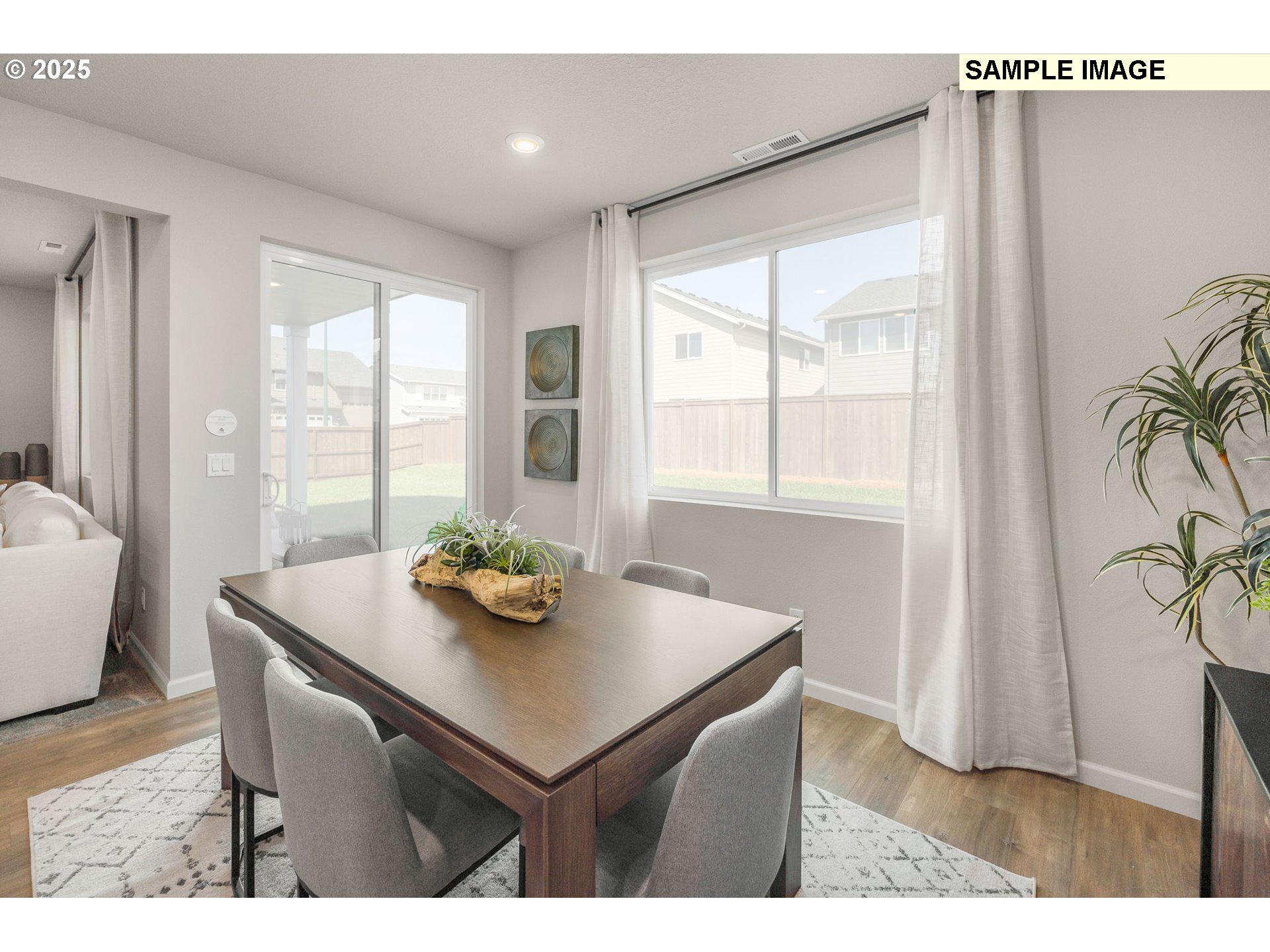 8916 Southwest Choke Cherry Tualatin, OR 97062 - Photo 14 of 29 a view of a dining room with furniture and window