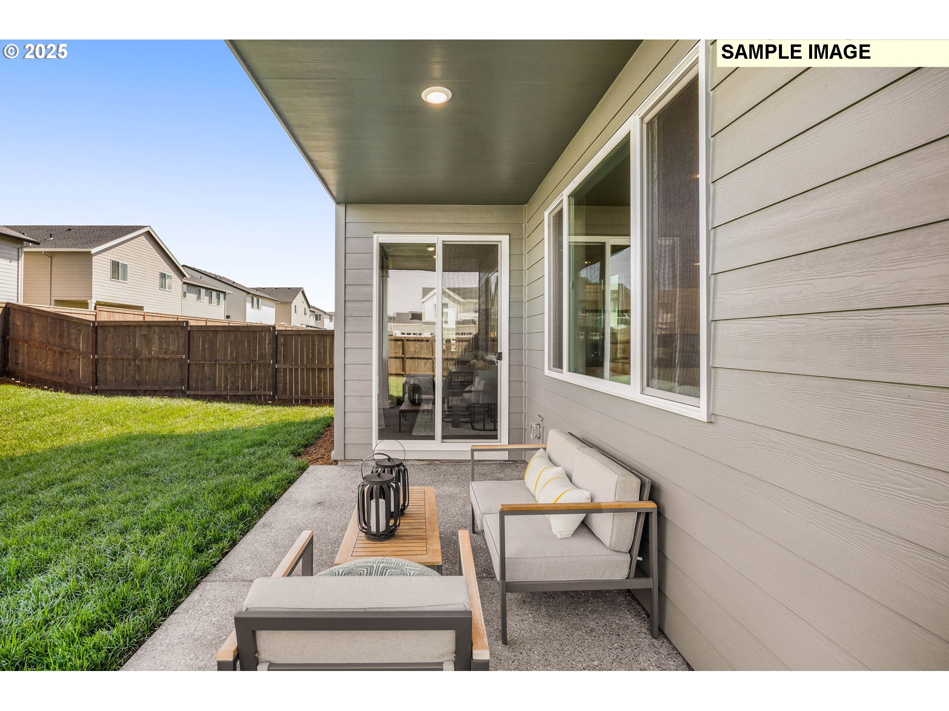 8916 Southwest Choke Cherry Tualatin, OR 97062 - Photo 15 of 29 a view of a house with backyard porch and sitting area