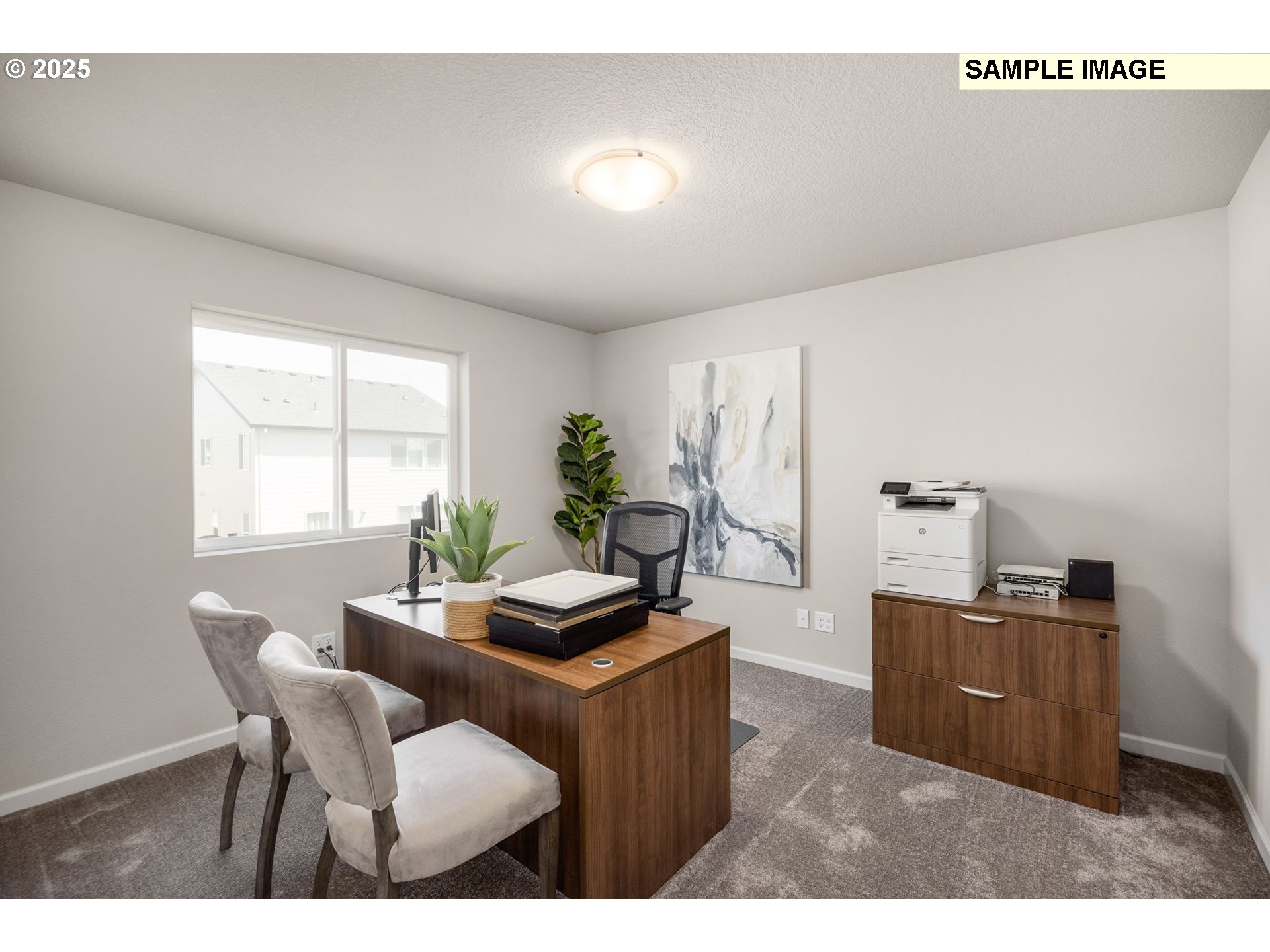 8916 Southwest Choke Cherry Tualatin, OR 97062 - Photo 23 of 29 a living room with furniture a window and wooden floor