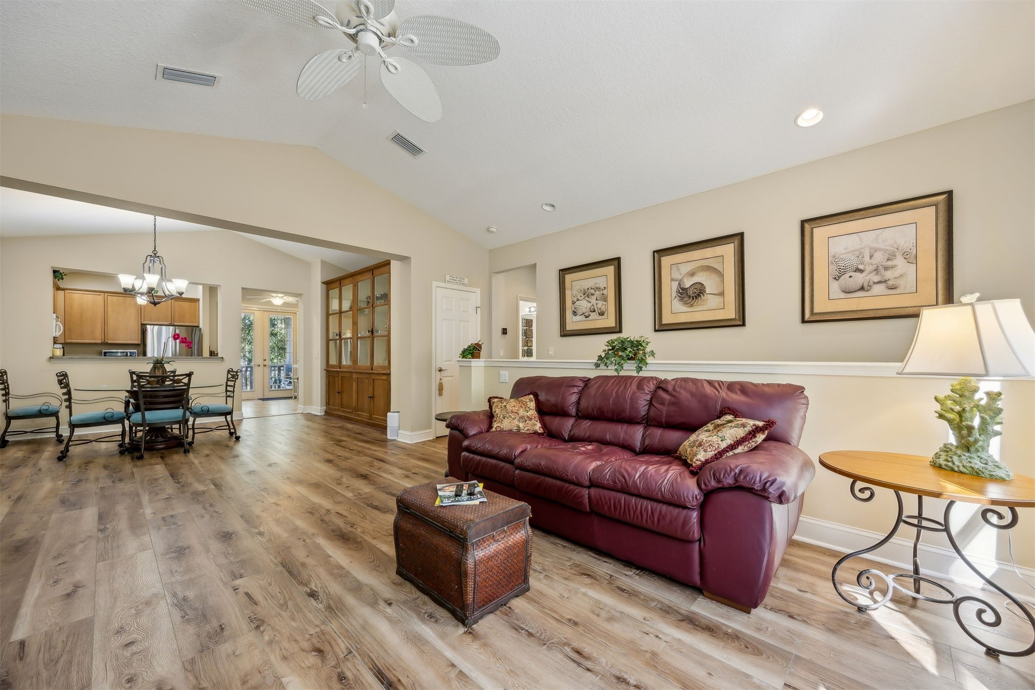 1839 Perimeter Park Road West, Unit 210 Fernandina Beach, FL 32034 - Photo 6 of 37 a living room with furniture and a wooden floor