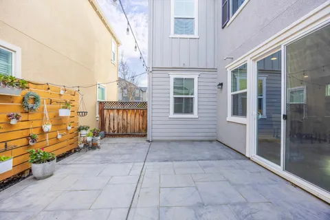 a view of a house with a sink and backyard