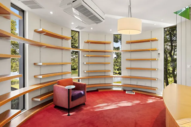 a room with furniture and a chandelier