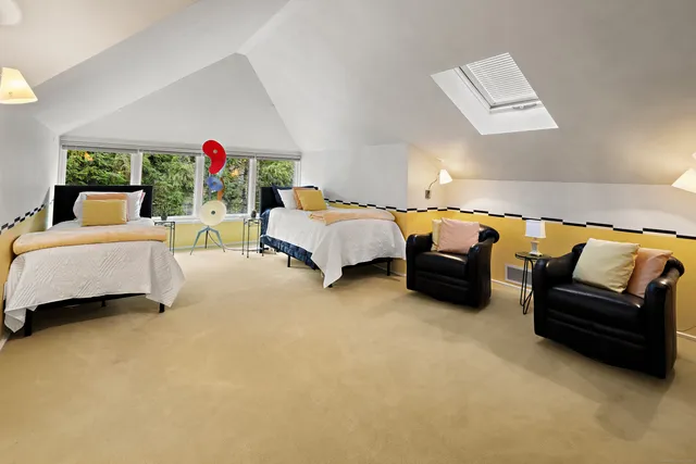 a bedroom with furniture and a couch