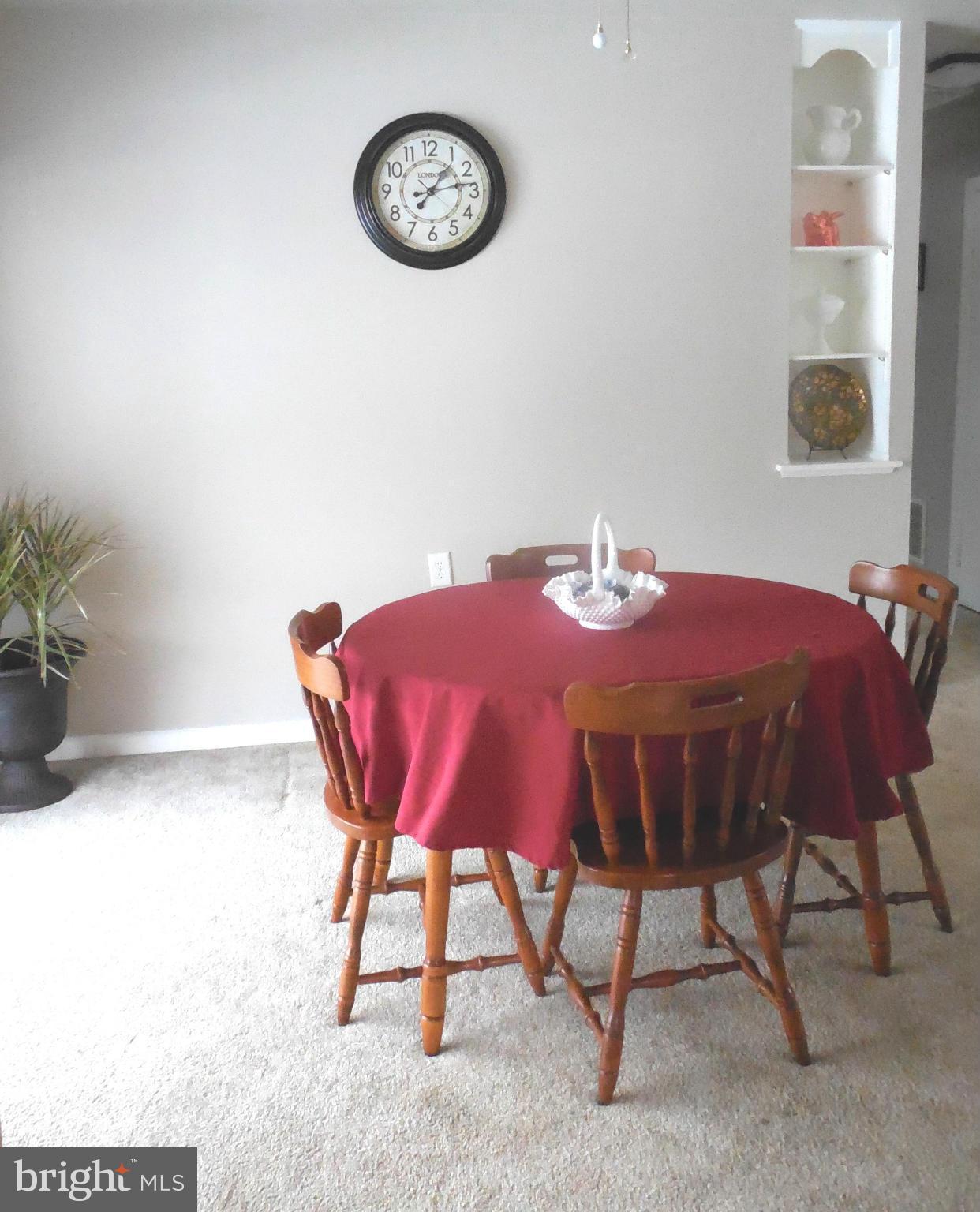 1322 Westburn Road Baltimore, MD 21228 - Photo 12 of 21 a view of a dining room with furniture and a chandelier