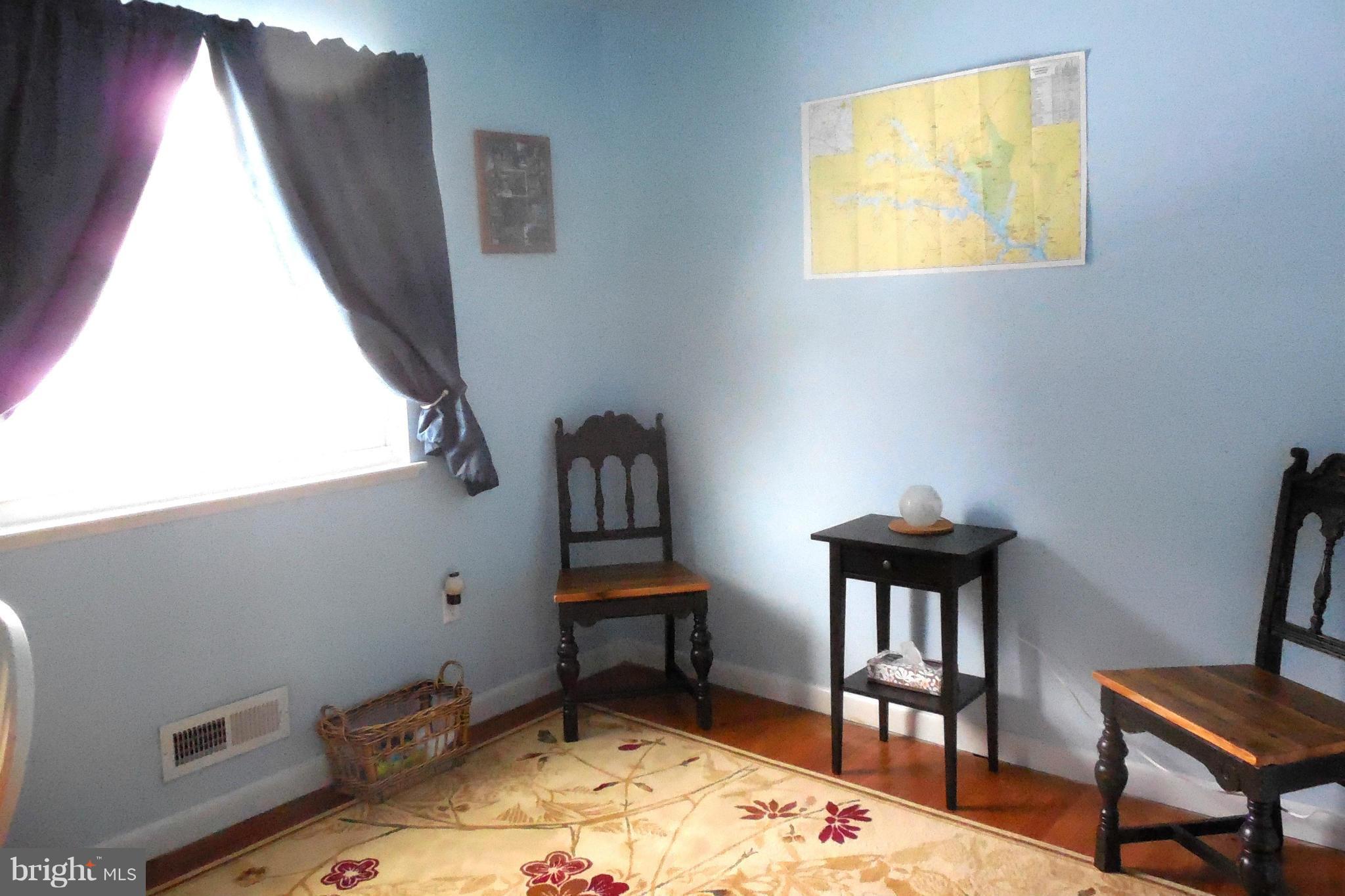 1322 Westburn Road Baltimore, MD 21228 - Photo 18 of 21 a bedroom with a bed and a window