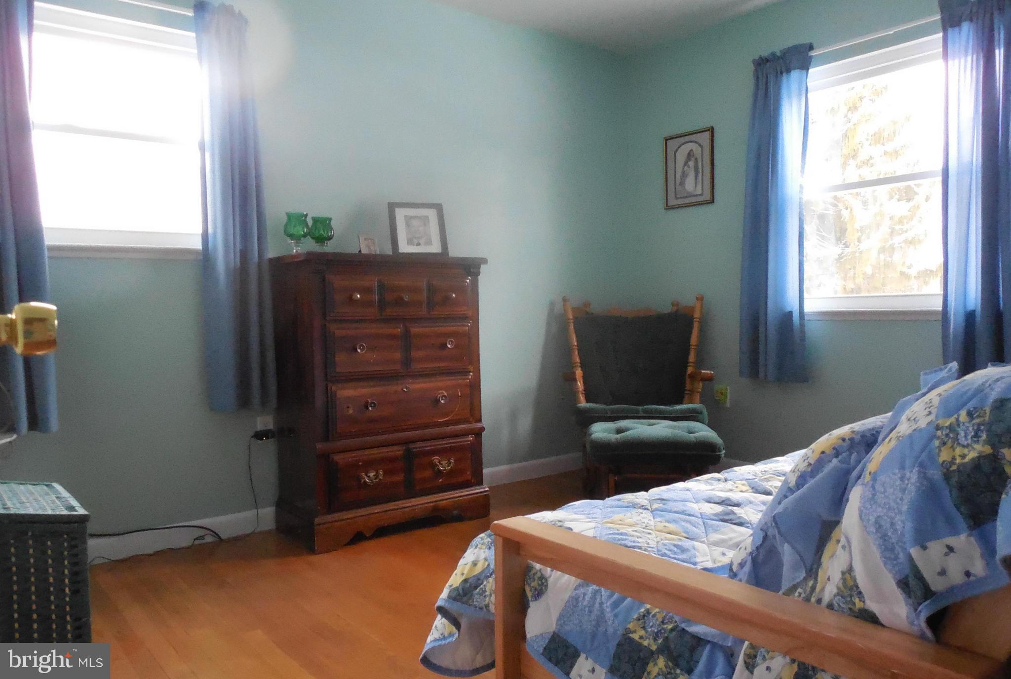 1322 Westburn Road Baltimore, MD 21228 - Photo 19 of 21 a bedroom with a bed and furniture