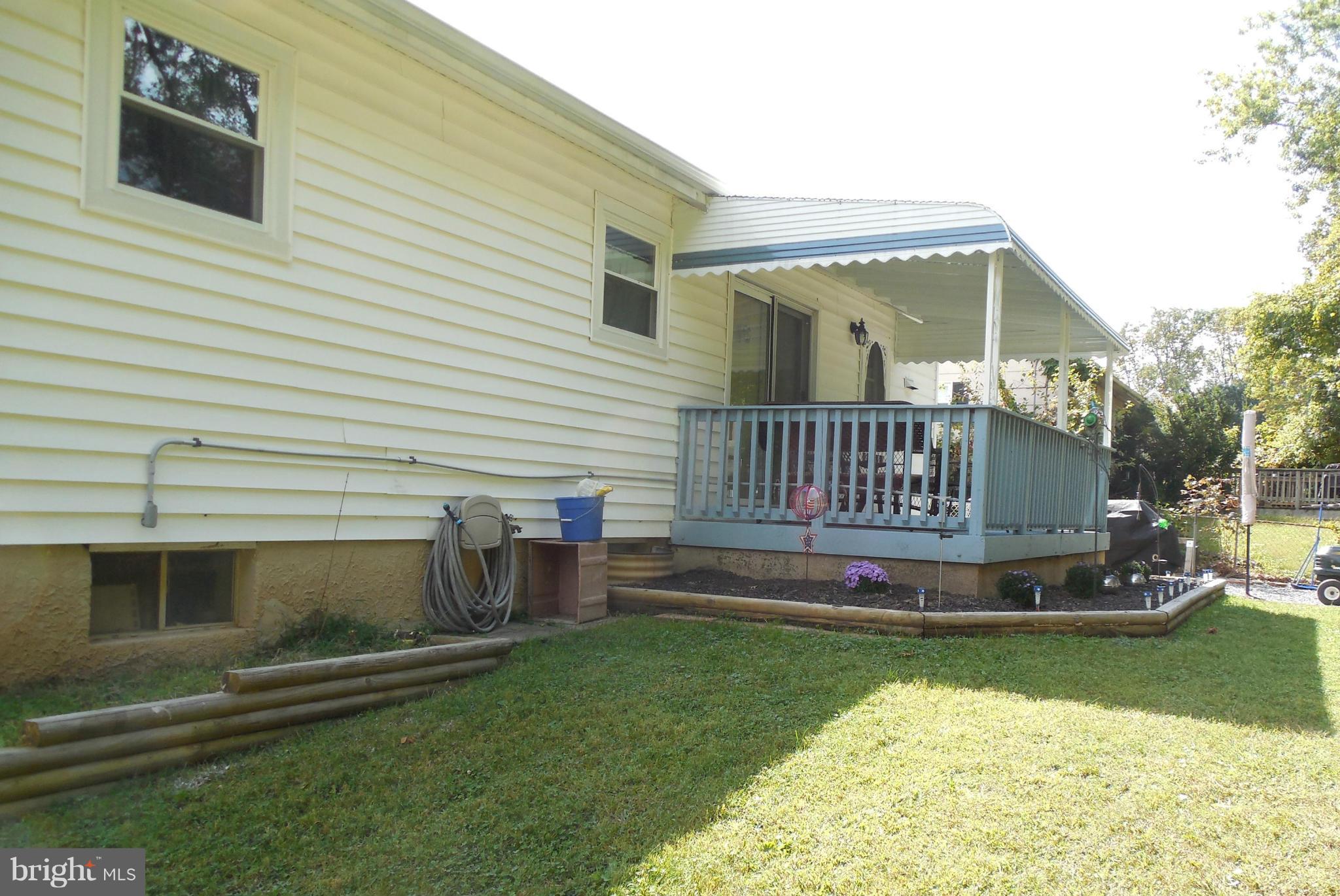 1322 Westburn Road Baltimore, MD 21228 - Photo 6 of 21 a view of a house with a yard