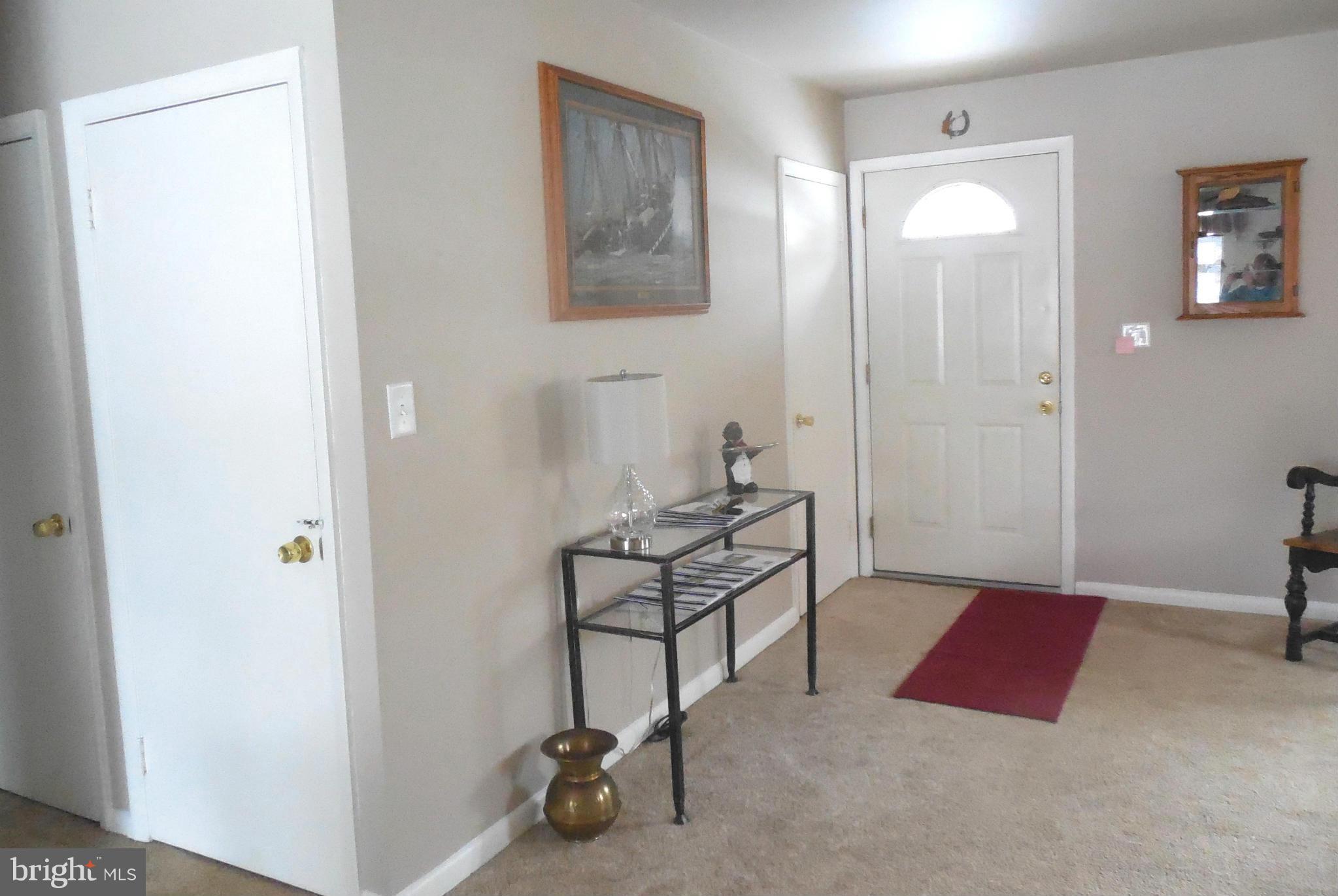 1322 Westburn Road Baltimore, MD 21228 - Photo 9 of 21 a living room with furniture and a window