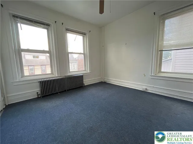 an empty room with a window