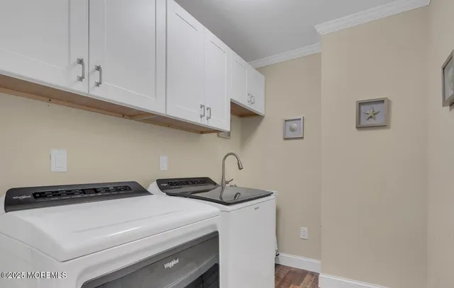 a kitchen with a stove and cabinets