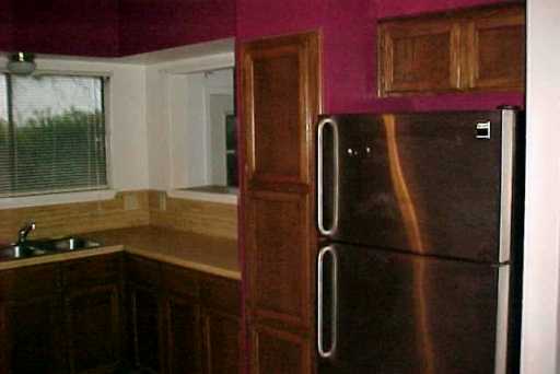 4947 Elm Hurst Lane Corpus Christi, TX 78413 - Photo 3 of 10 a bathroom with a bathtub and a shower