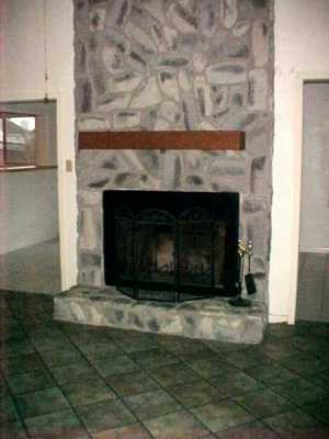 4947 Elm Hurst Lane Corpus Christi, TX 78413 - Photo 4 of 10 a living room with a fireplace